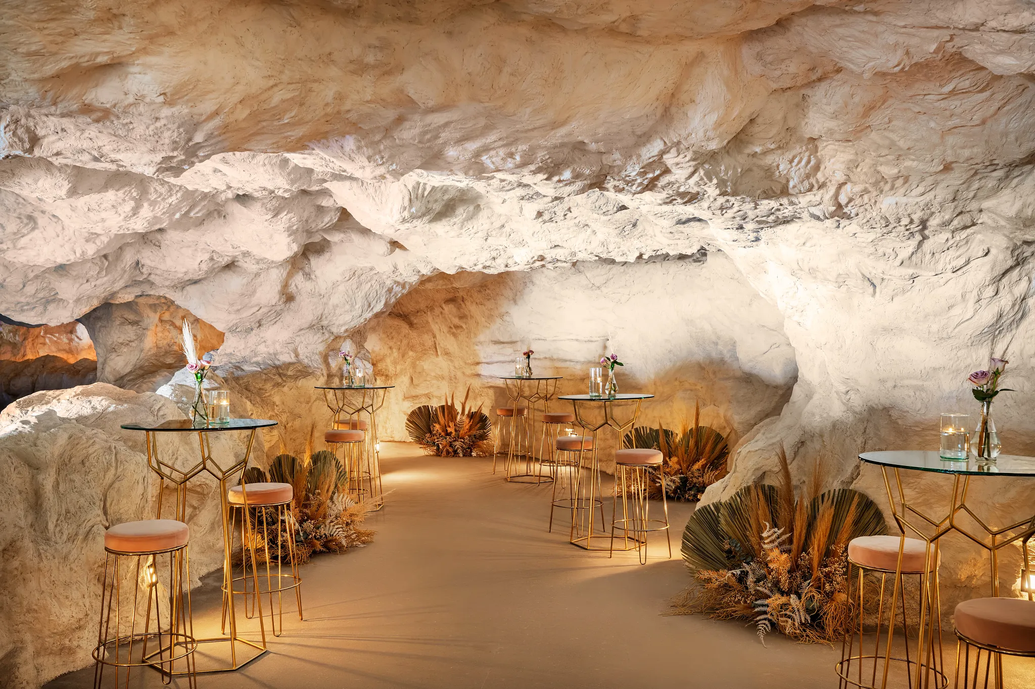 Unique cave-style cocktail reception venue with lounge tables at Dreams Estrella del Mar Mazatlán