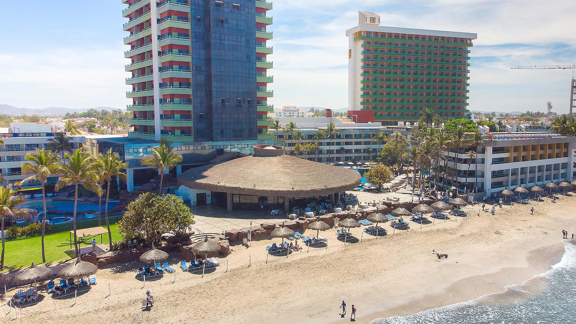 El Cid El Moro Beach Hotel Mazatlan beachfront resort with pools, ocean views, and classic Mexican resort architecture.