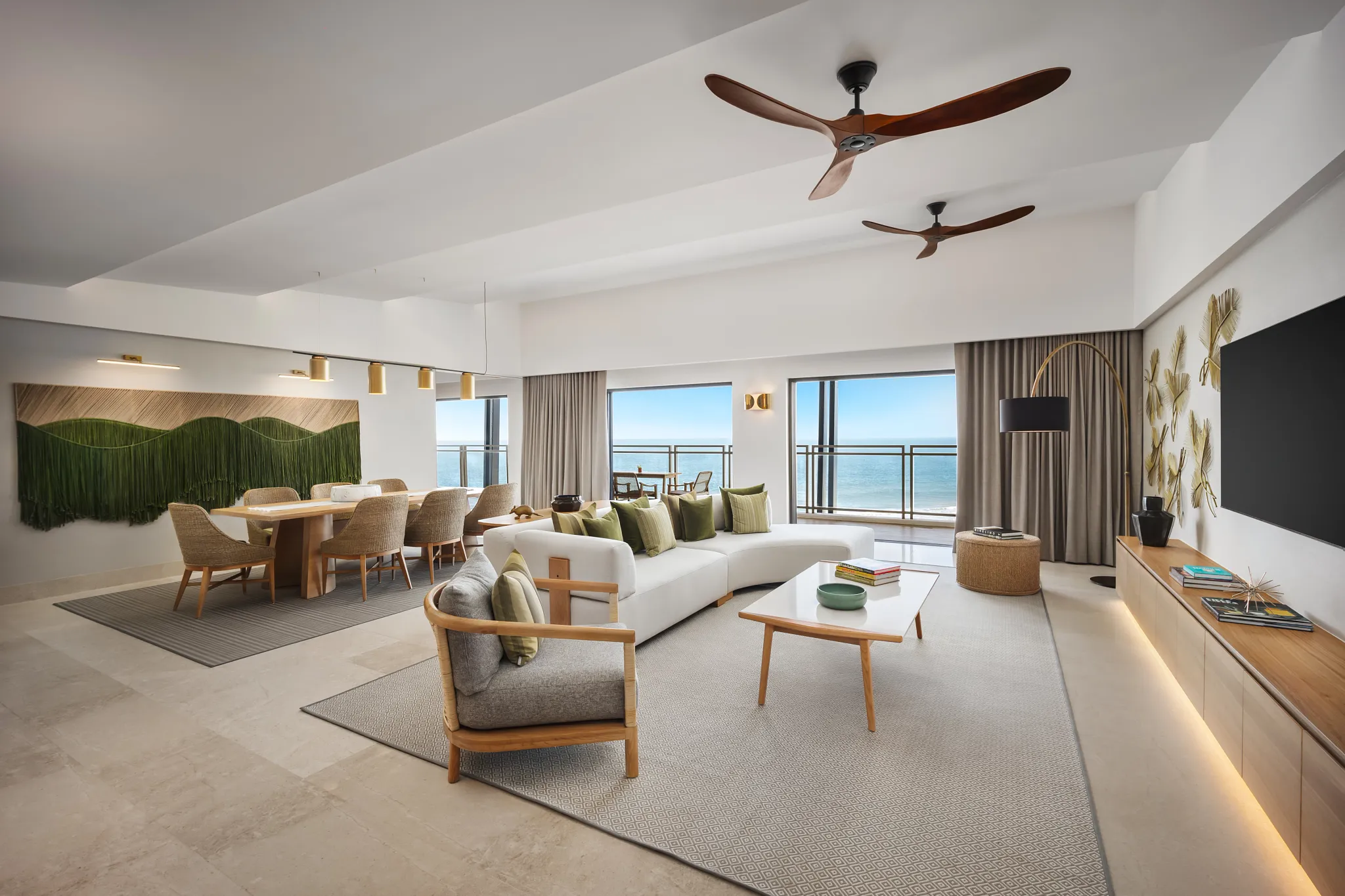 One-Bedroom Presidential Suite Ocean Front living and dining area with ocean views at Dreams Estrella del Mar Mazatlan.