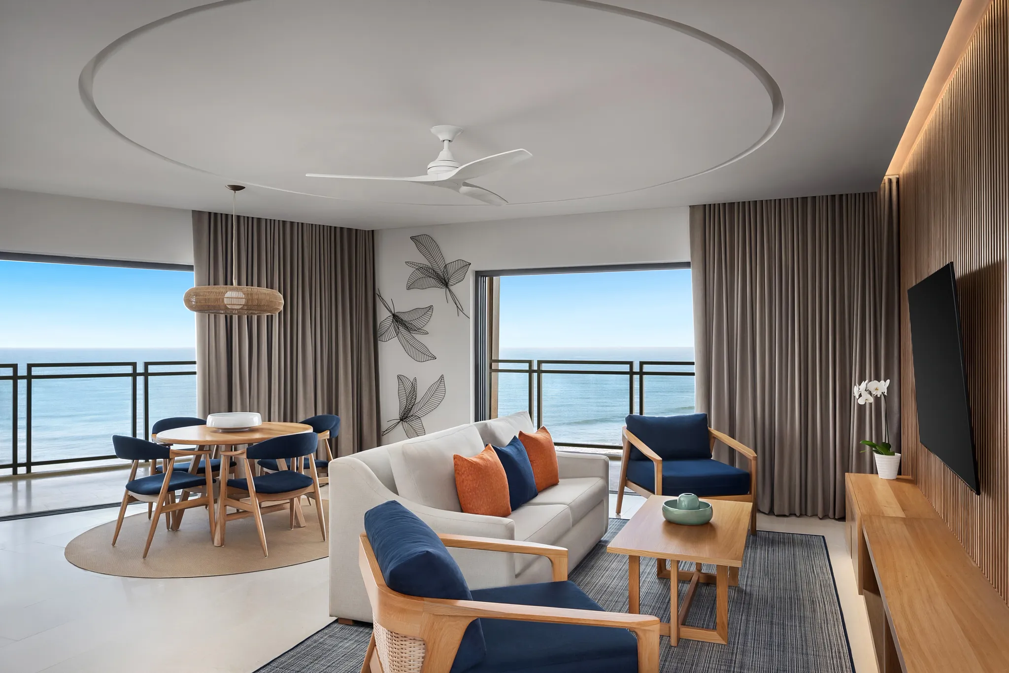 Preferred Club Master Suite Ocean Front living room with dining area at Dreams Estrella del Mar Mazatlan.