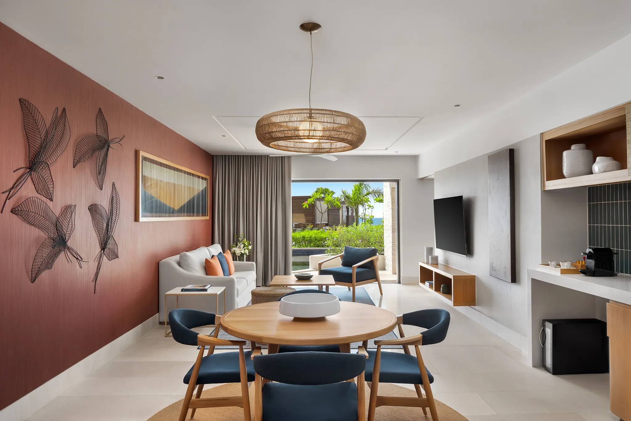 Preferred Club Premium Master Suite Swim Out living room with dining area at Dreams Estrella del Mar Mazatlan.