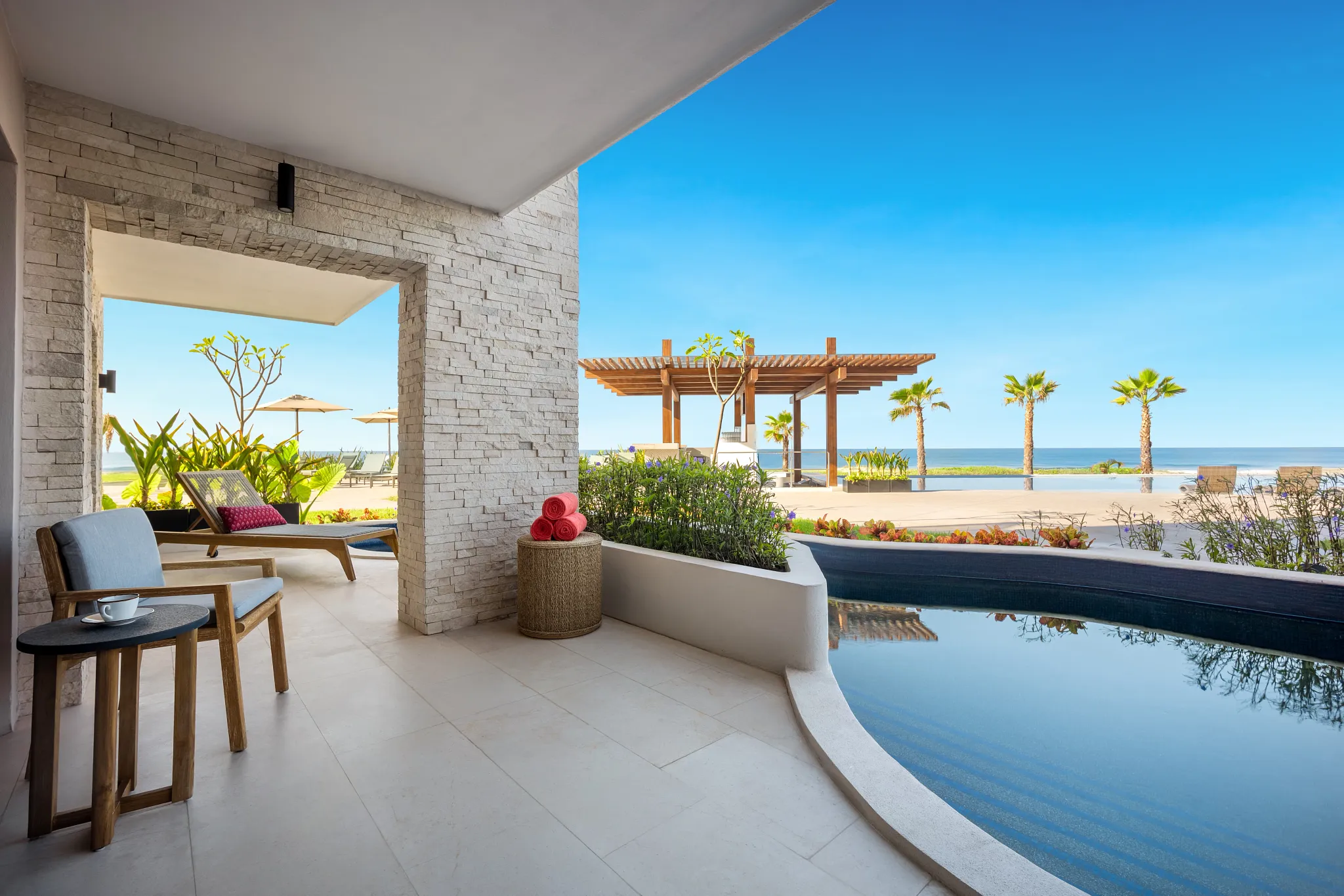 Preferred Club Premium Master Suite Swim Out terrace overlooking the swim-out pool at Dreams Estrella del Mar Mazatlan.