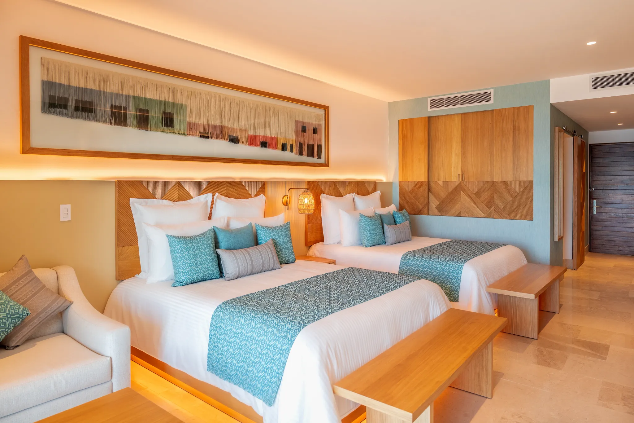 Preferred Club Premium Swim Out suite with two double beds at Dreams Estrella del Mar Mazatlan Golf & Spa Resort.