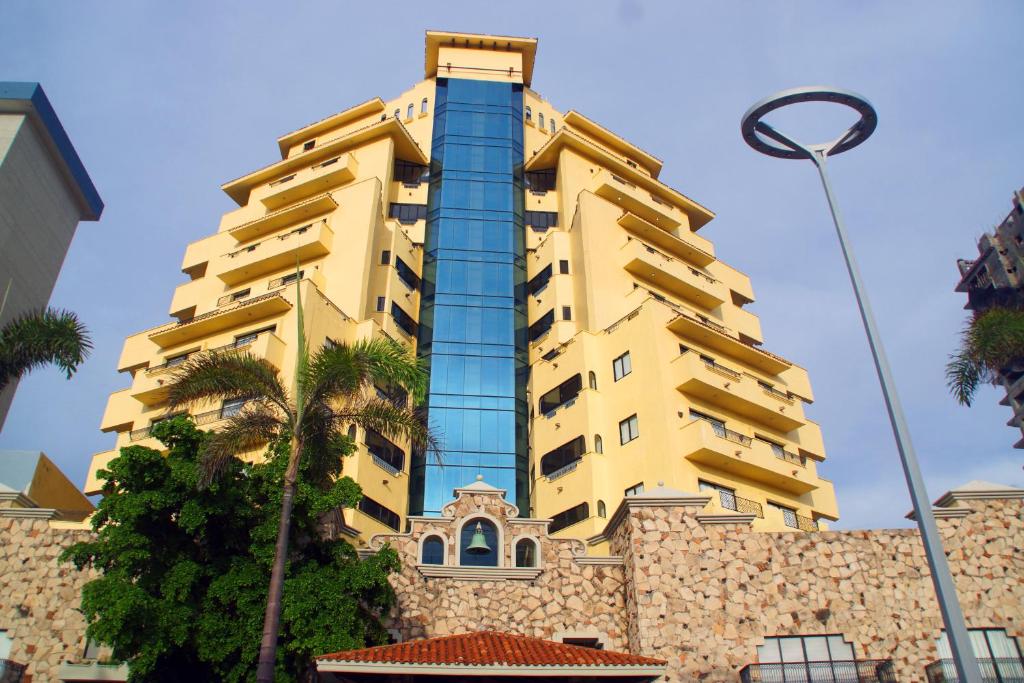 Royal Villas Resort Mazatlan beachfront property with pool area and Pacific Ocean views in the Golden Zone.