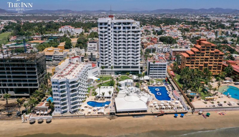 The Inn at Mazatlan Beachfront Resort showing oceanfront location along the Golden Zone with pools and beach access.
